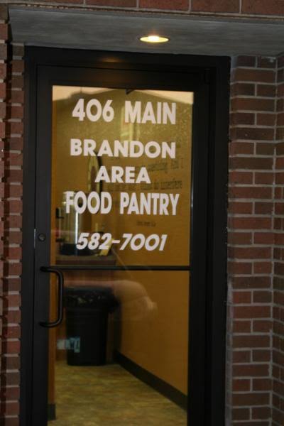 Brandon Area Food Pantry Glass Front Door with Address